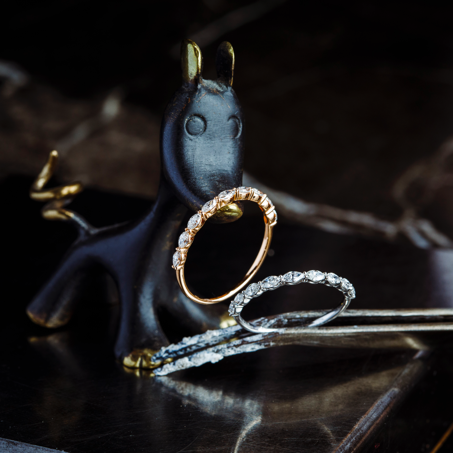 Subtle and sleek, refined with diamonds. This Oliver Heemeyer creation is made of 18k rose gold and set with marquise cut diamonds in a half circle setting. A perfect everyday jewellery piece. Different perspective.