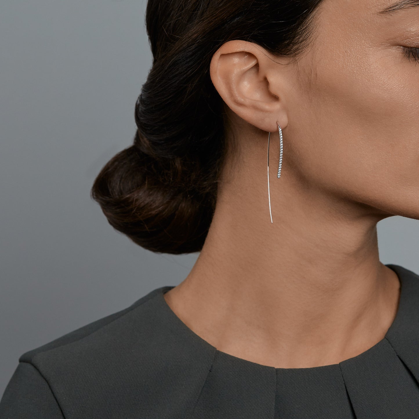 Woman wearing the Oliver Heemeyer Ella Diamond Earrings 0.33 ct. in 18k white gold.