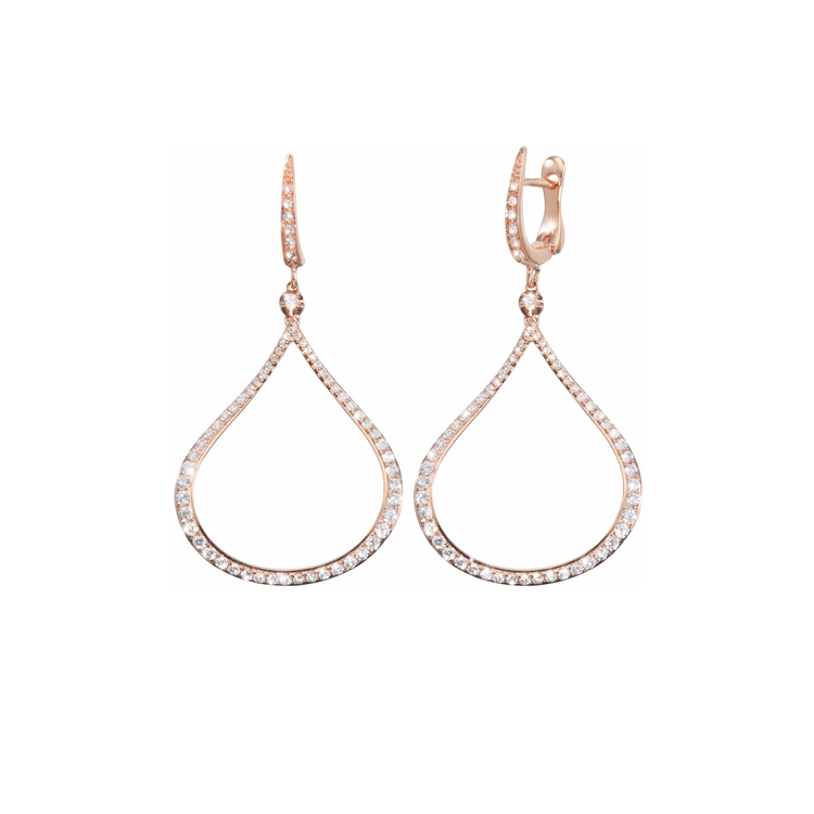 The Oliver Heemeyer Splash earrings are made of 18k rose gold. Set with diamonds, finished off with a single diamond on its top and dangling on a golden u-shape mini hoop.