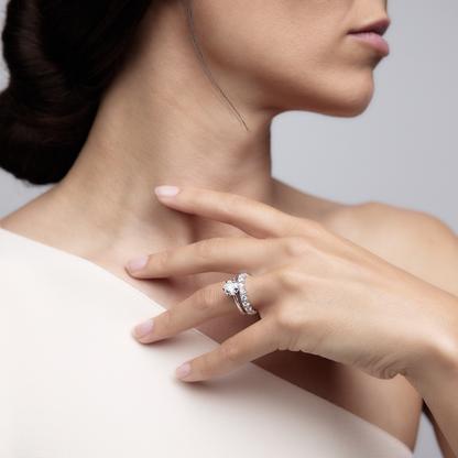 Woman wearing the Holly Eternity Diamond Ring FC No. 2 made of 18k white gold.