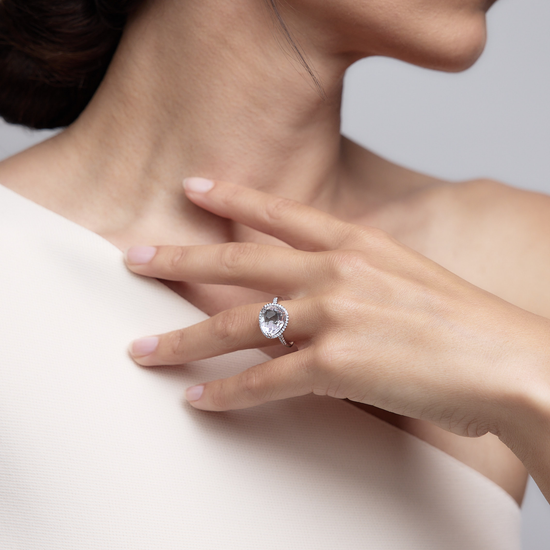 Woman wearing the Oliver Heemeyer Jamie Rock Crystal Ring made of 18k white gold.
