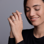 Woman wearing the Oliver Heemeyer Wynn Diamond Ring made of 18k rose gold.
