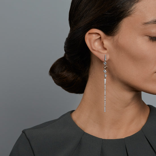 Woman wearing the Oliver Heemeyer Adaline diamond earrings.