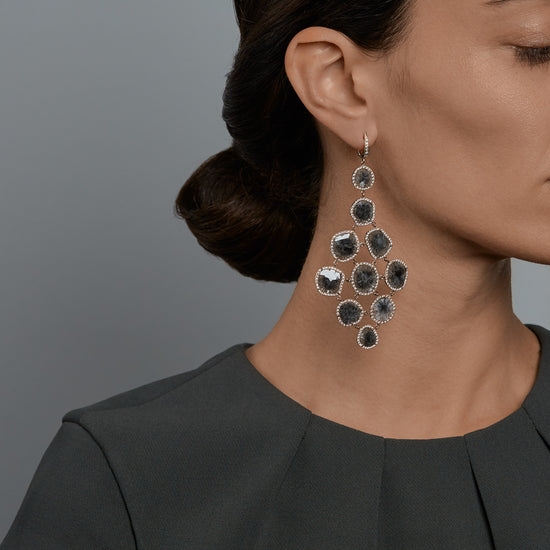 Woman wearing the Oliver Heemeyer Grace Matrix diamond earrings.