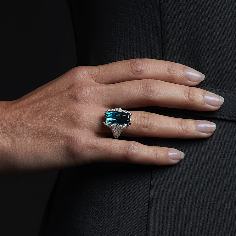 Woman wearing the Oliver Heemeyer Ximena Tourmaline ring. Close up.
