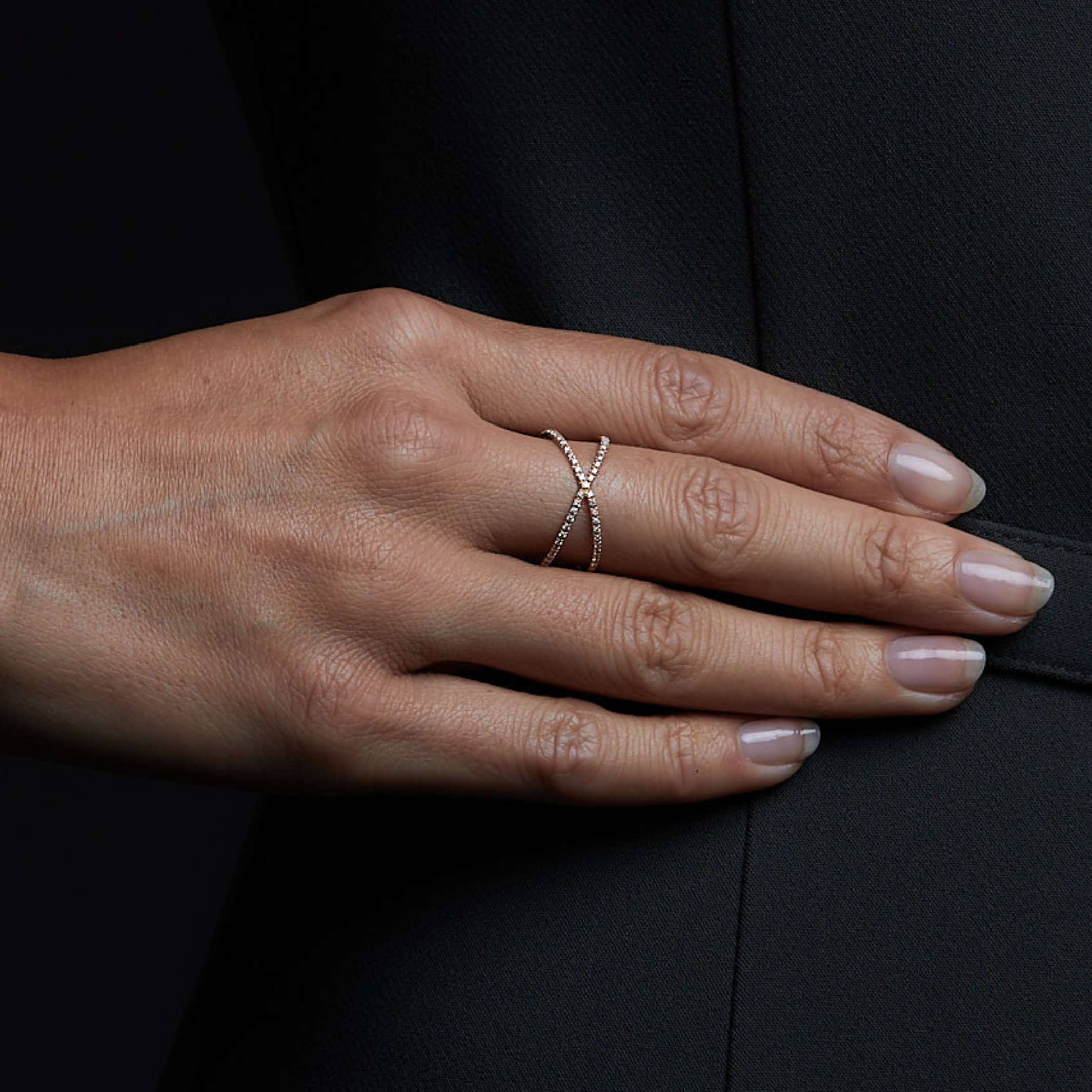 Woman wearing the Oliver Heemeyer Orbit Diamond Ring Small. Close Up.