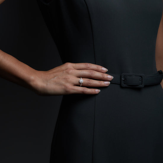 Woman wearing the Oliver Heemeyer Carrie diamond ring fancy edition in 18k white gold.