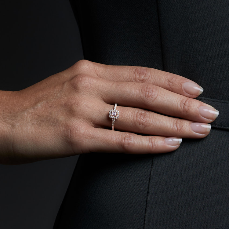 Woman wearing the Oliver Heemeyer Cora Diamond Ring Emerald Cut. Close up.
